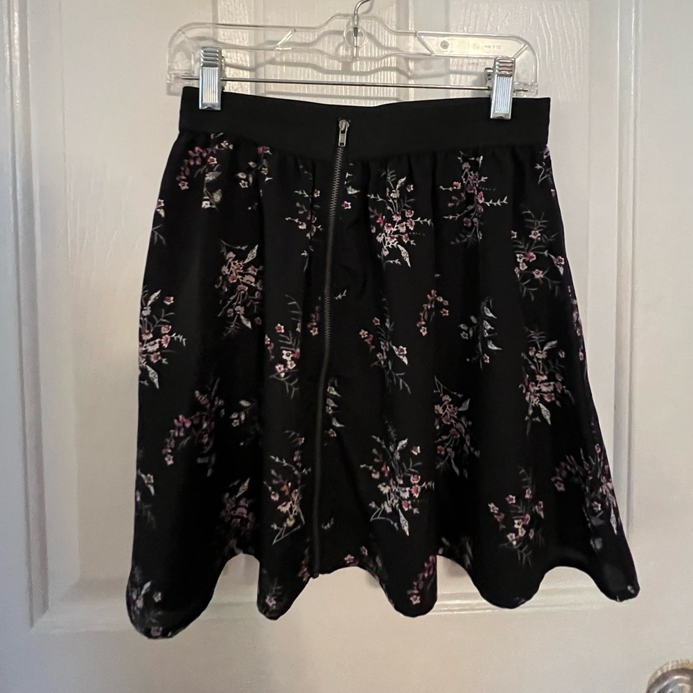 Black floral mini skirt